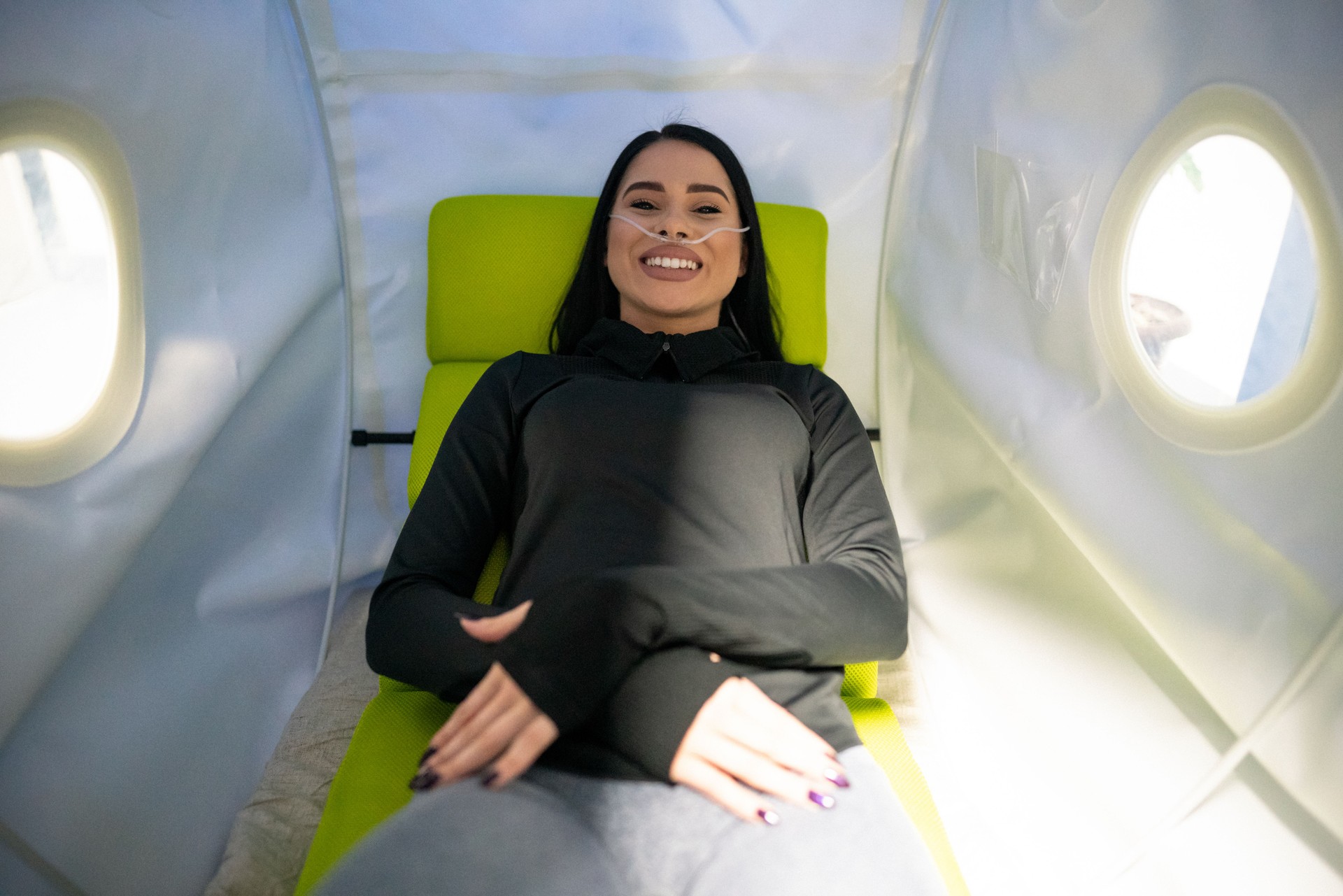 Young woman 
on treatment in the hyperbaric oxygen chamber